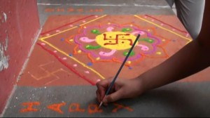 Our student creating her own Rangoli.