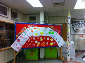 The completed "Colour Your World" bulletin board.
