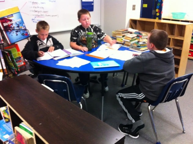 Some Math collaboration. We have a Math expert at this table who is helping peer-teaching his classmates. 