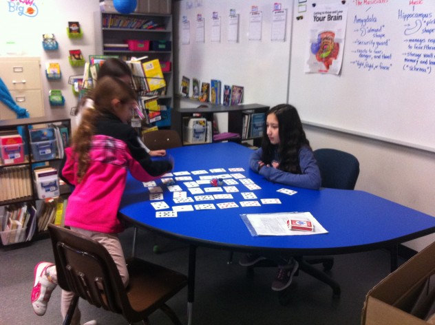 Some Gr. 4 students practicing multiplication with a Math game. 